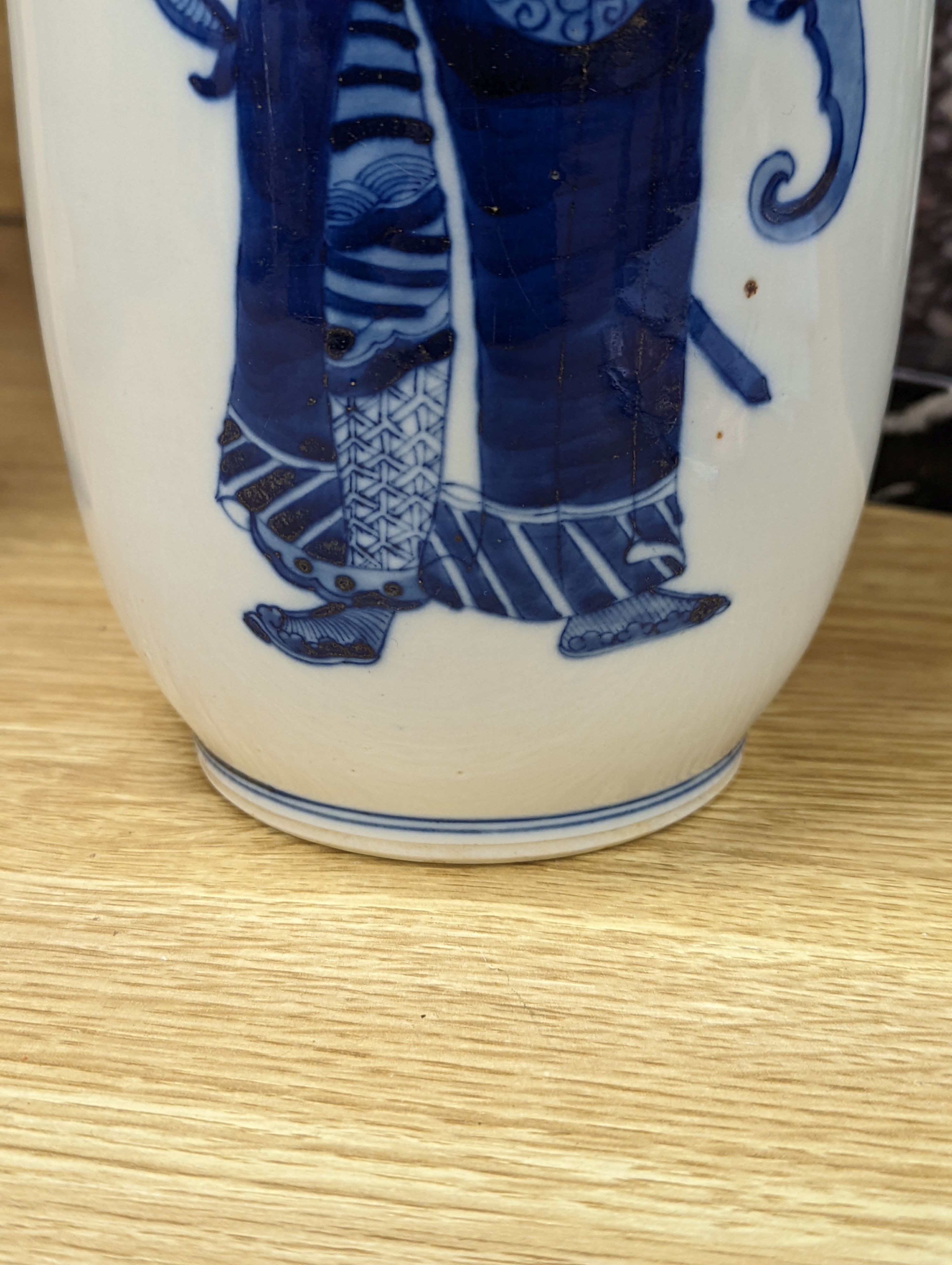 A Chinese blue and white rouleau vase, 35 cms.